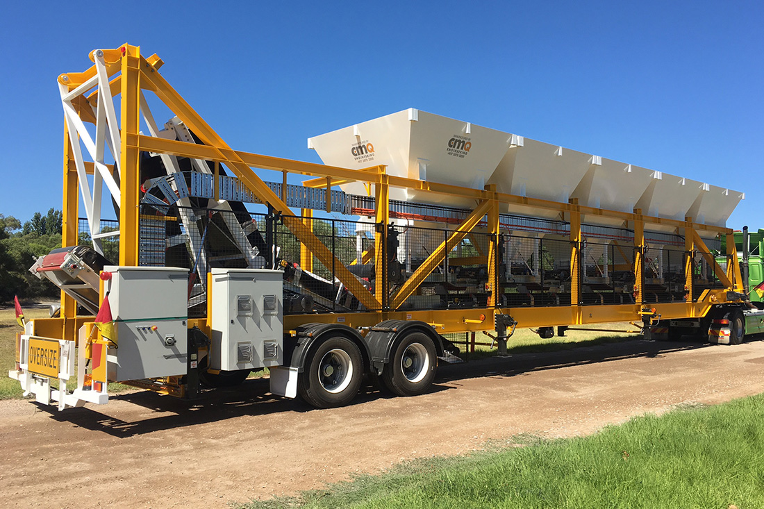 New mobile concrete plant on a dirt road | Featured image for Mobile Equipment Landing Page for CMQ Engineering USA.