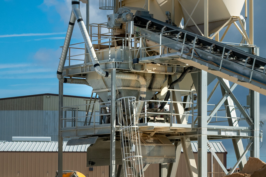 Weighed aggregate holding hopper at a ready mix concrete plant in central Texas.