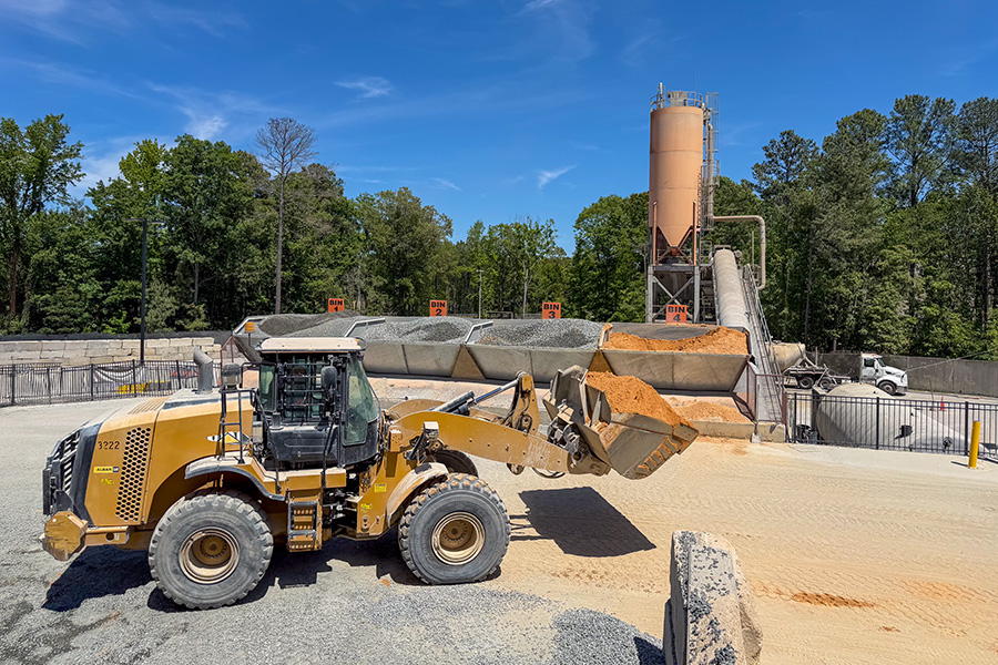 A front-end loader loads aggregates at a ready mixed concrete batch plant in North Carolina.