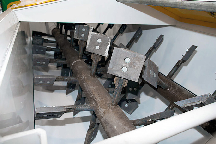 Mixing chamber of a CMQ Engineering twin-shaft mixer / pugmill.