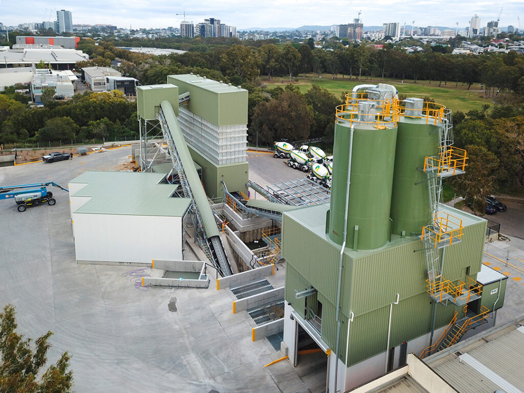 This concrete plant near Brisbane, Australia, features dual alley, drive-over aggregate unloading.