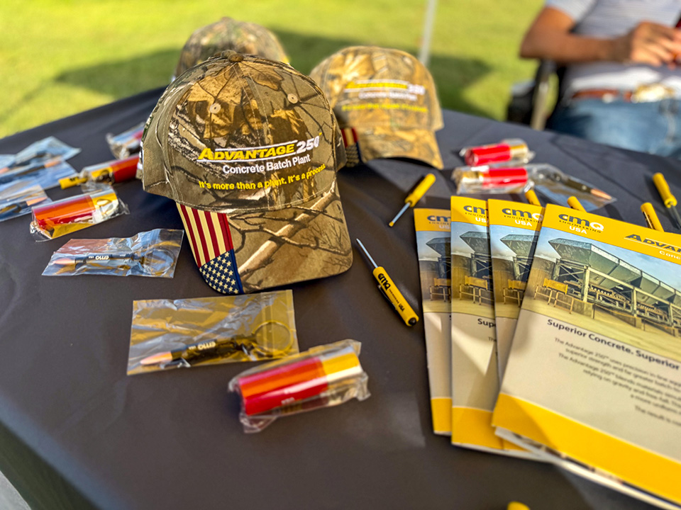 Brochures and promotional items available at the CMQ Engineering USA tent.