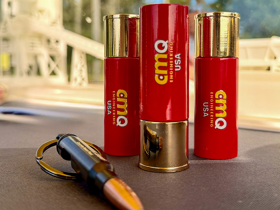 Promotional bottle openers shaped like shotgun shells seemed appropriate for a sporting clays tournament.