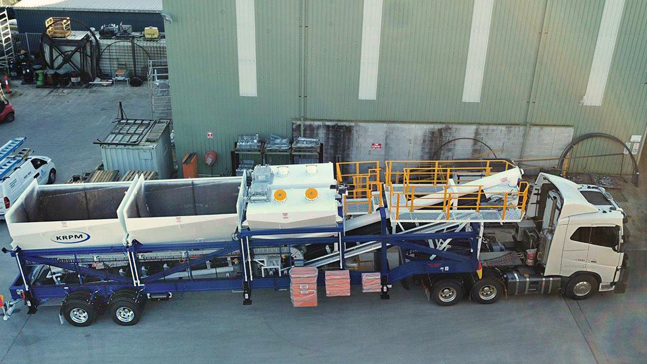 Overhead view of a DualBatch™ mobile concrete plant as it departs the CMQ Engineering manufacturing facility.