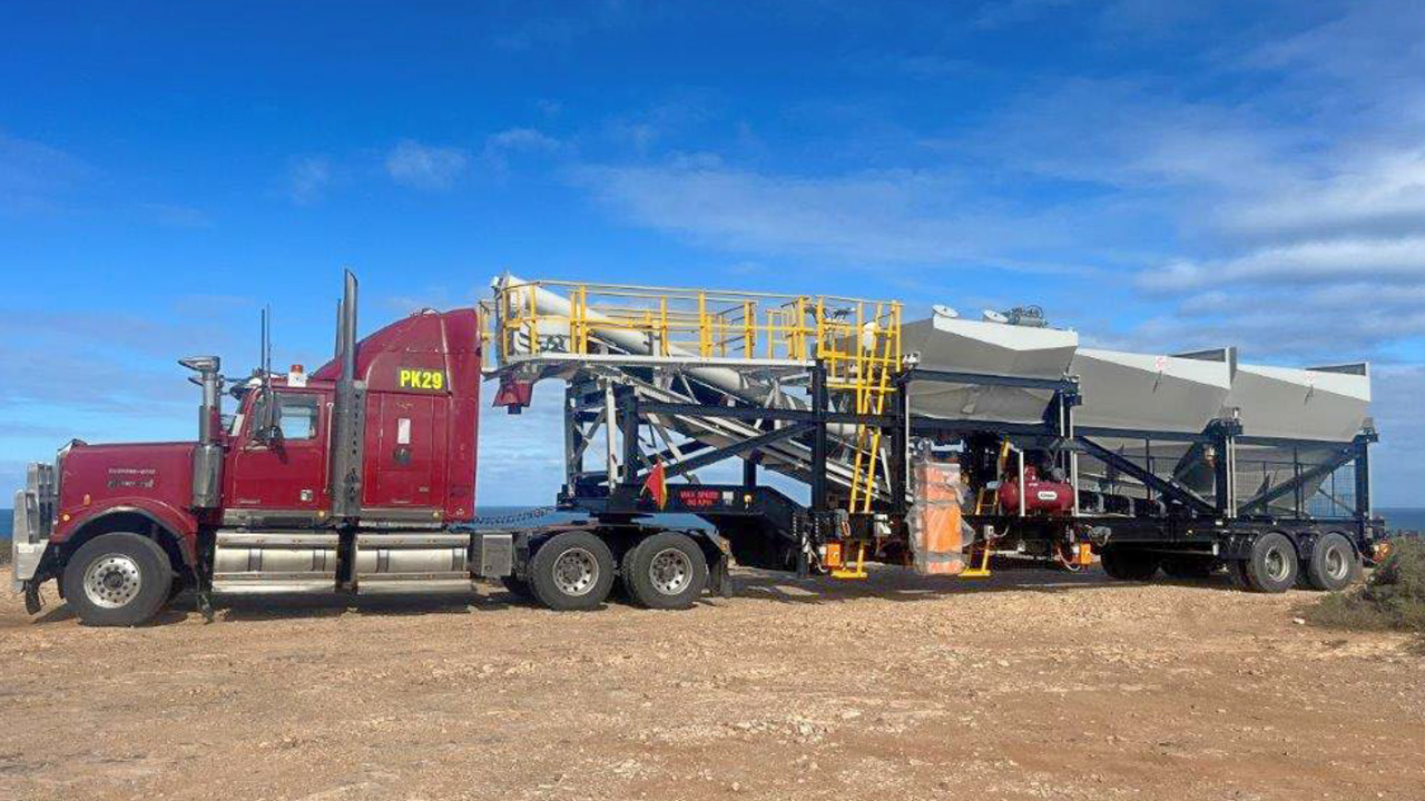 A DualBatch™ mobile concrete plant arrives at a remote jobsite for set-up.