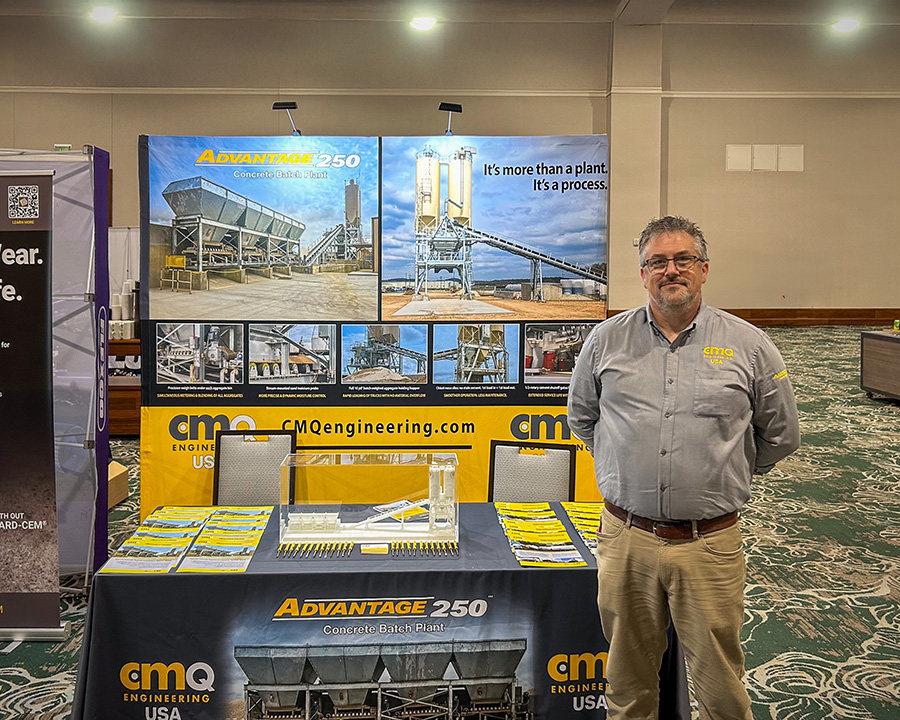 CMQ Engineering USA Marketing Director, Michael Maddox stands with the company's exhibit display at the TACA 72nd annual meeting in San Antonio.